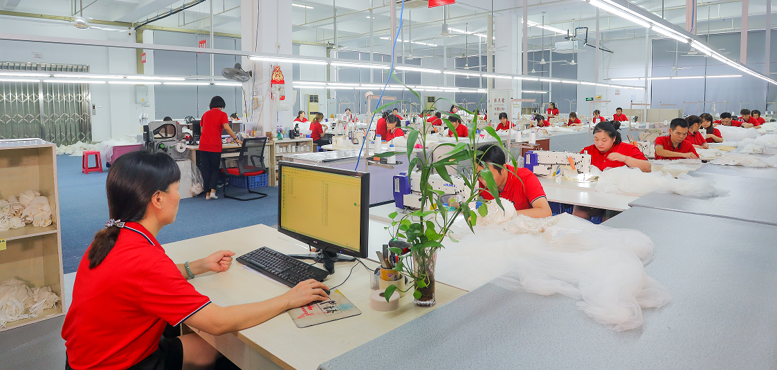 Design team sketching bridal patterns